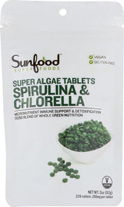 Close-up of Sunfood Chlorella Spirulina tablets bottle, vegan greens rich in nutrients