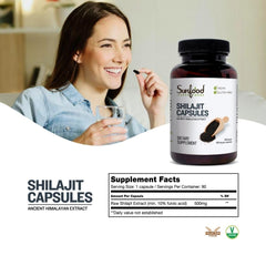Sunfood Shilajit Capsules on a wooden surface, showcasing mineral-rich energy and focus potential.