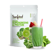 Sunfood Supergreens & Protein powder scoop beside a glass, supports daily energy and gut-friendly nutrition.