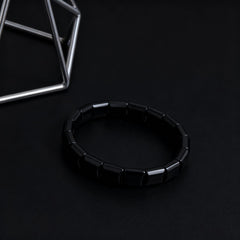 Sunglnl Hematite bracelet in a sleek gift box, ready to gift.