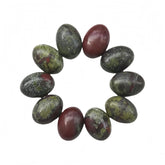 Sunshcat Dragon Blood Jasper oval flatback close up showing natural color and texture for jewelry