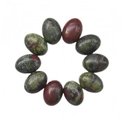 Sunshcat Dragon Blood Jasper oval flatback close up showing natural color and texture for jewelry