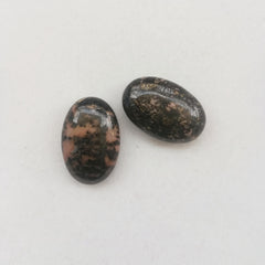 Sunshcat rhodonite palm stone ideal for meditation, stress relief, and mindful breathing