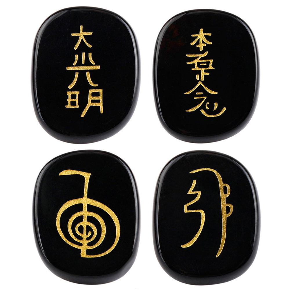 SUNYIK flat oval black agate palm stone with engraved Usui symbols for meditation and grounding.