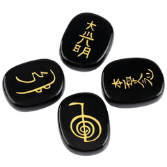 SUNYIK polished black agate palm stones support centering and mindful breathing.