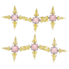 Rose quartz pyramid close-up highlighting the four-direction energy and apex focus.