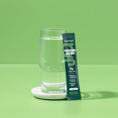 Unflavored Supergut Foundational Daily Fiber powder dissolves clear in water