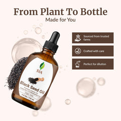 Massaging SVA Black Seed Oil into the scalp for conditioning.