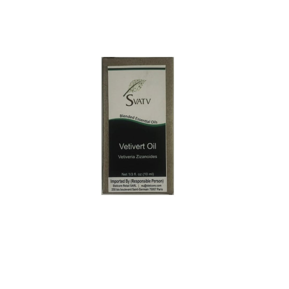 SVATV Vetivert essential oil bottle pour shows earthy grounding aroma for diffuser use.