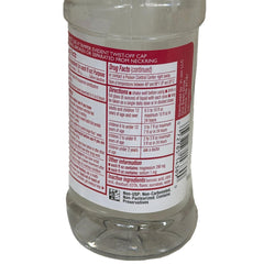 Swan Magnesium Citrate Cherry bottle being poured into a glass for serving.