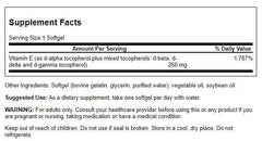Swanson E-400 softgels poured from bottle for easy daily intake