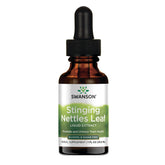 Swanson Stinging Nettles Liquid Extract bottle pour, easy daily dosing for wellness.