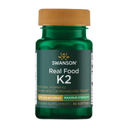 Swanson Vitamin K2 bottle pour showing natto-derived calcium regulation support.
