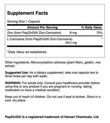 Closeup of Swanson Zinc Carnosine capsules highlighting the chelated formula.