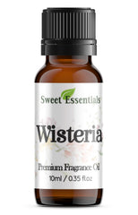Sweet Essentials Wisteria bottle closeup displaying premium fragrance for home use