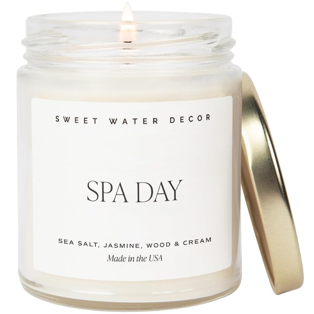 Sweet Water Decor Spa Day candle in a clear jar with gold lid adds stylish decor