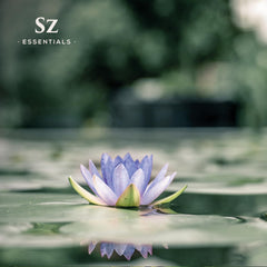 Sz Essentials Blue Lotus oil bottle with label showing ingredients.