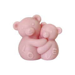 T-Shin Hugging Bears candle blue embrace for cozy ambience and relaxation.