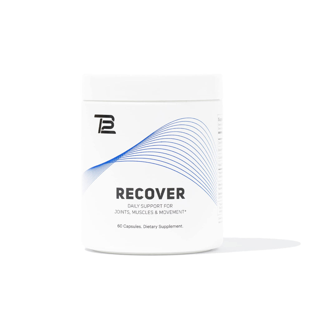TB12 Recover bottle closeup showing compact capsules for daily recovery