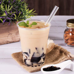 Bubble tea with grass jelly topping, showcasing versatile drinks.
