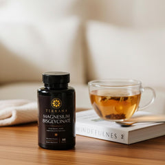 Capsules being poured from a Terrana bottle for daily supplementation