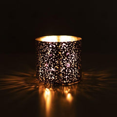 Terreux Patchouli Sandalwood candle mood lighting for a relaxing evening at home.