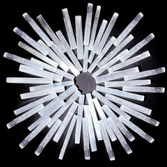 Tessco for you selenite wand closeup highlighting pure white crystal energy