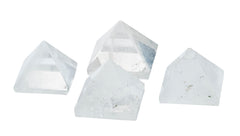 The Chrysalis Stone Pyramid Clear Quartz Mini in hand for mindful energy work.