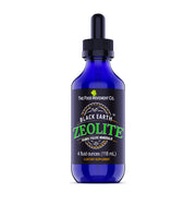 The Food Movement Co. Black Earth Zeolite bottle pour demonstrates easy daily dosing.