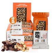 The GFB chocolate peanut butter bar close-up showing chewy texture and peanut bits, a tasty vegan snack.