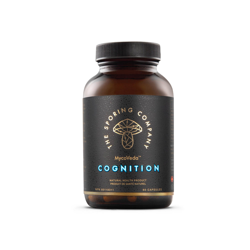 The Sporing Company Mycoveda Cognition capsules close-up for daily focus.