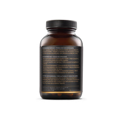 The Sporing Company Mycoveda Cognition capsules in hand for on-the-go focus.