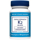 The Vitamin Shoppe Vitamin K2 MK-7 bottle highlights 120 vegetable capsules for bone and heart health.