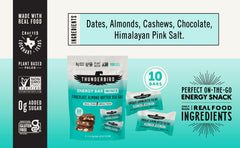 Thunderbird Chocolate Almond Butter Sea Salt mini energy bar in hand, ready for on-the-go nourishment.
