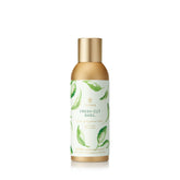 Thymes Fragrance Mist Fresh-Cut Basil bottle highlights a herbaceous, inviting aroma for any room.