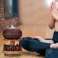 TJ.MOREE Bamboo Diffuser Holder Carousel storage area keeps bottles organized within reach.