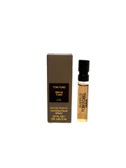 Tom Ford Ebene Fume bottle with wood-embossed plaque evokes luxury packaging for a meditative mood.