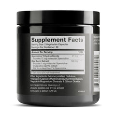 Toniiq spermidine capsules close-up showing vegan capsules