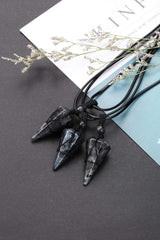 Top Plaza pointed pendant measures 37-39mm for bold, elegant look.