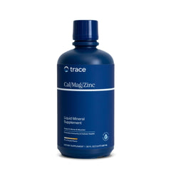 Trace Minerals Cal/Mag/Zinc bottle being poured for daily mineral support.