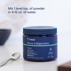 Trace Minerals Stress-X magnesium powder in a glass provides a bright, energizing mix