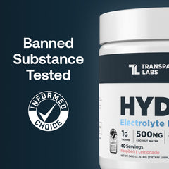 Transparent Labs Hydrate tropical-punch powder ready to mix for workouts.