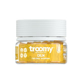 Troomy Reishi Calm Gummies bottle on desk highlighting gelatin-free design
