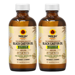 Tropic Isle Black Castor Oil Light Blend bottle pour for lightweight moisture on hair