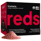 TRUMETA Reds powder packaging on table showing USDA organic certification and convenience for on the go.
