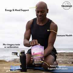 TruWild kombucha powder glass with mixed beverage ready to sip