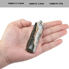 TUMBEELLUWA crystal wand with pointed tip used for energy focus in rituals.