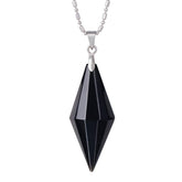 TUMBEELLUWA healing crystal pendant close-up showing black obsidian point for meditation