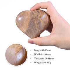 TUMBEELLUWA orange moonstone heart provides calm focus in quiet moments.