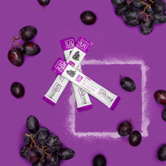 Ultima Replenisher grape dissolving in water captures quick electrolyte refreshment.